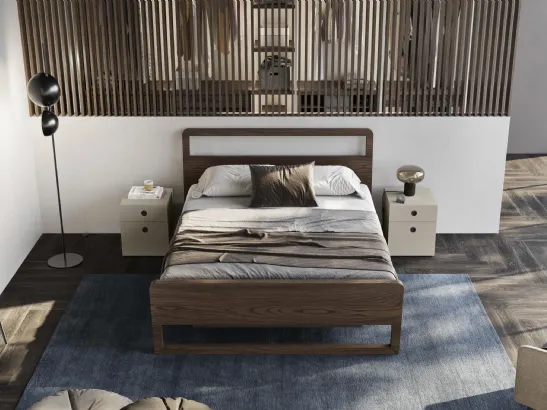 Letto in legno con testiera e box contenitore sollevato da terra Feel di Fimar